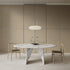 Lambda Dining Table with sculptural folded base and elegant contemporary finishes by Rimadesio | Casa Design Group