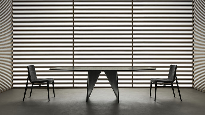 Lambda Dining Table with sculptural folded base and elegant contemporary finishes by Rimadesio | Casa Design Group