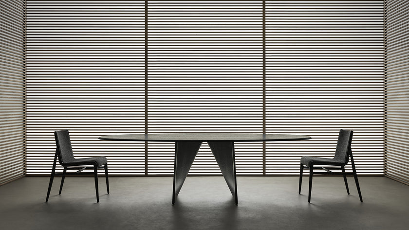 Lambda Dining Table with sculptural folded base and elegant contemporary finishes by Rimadesio | Casa Design Group