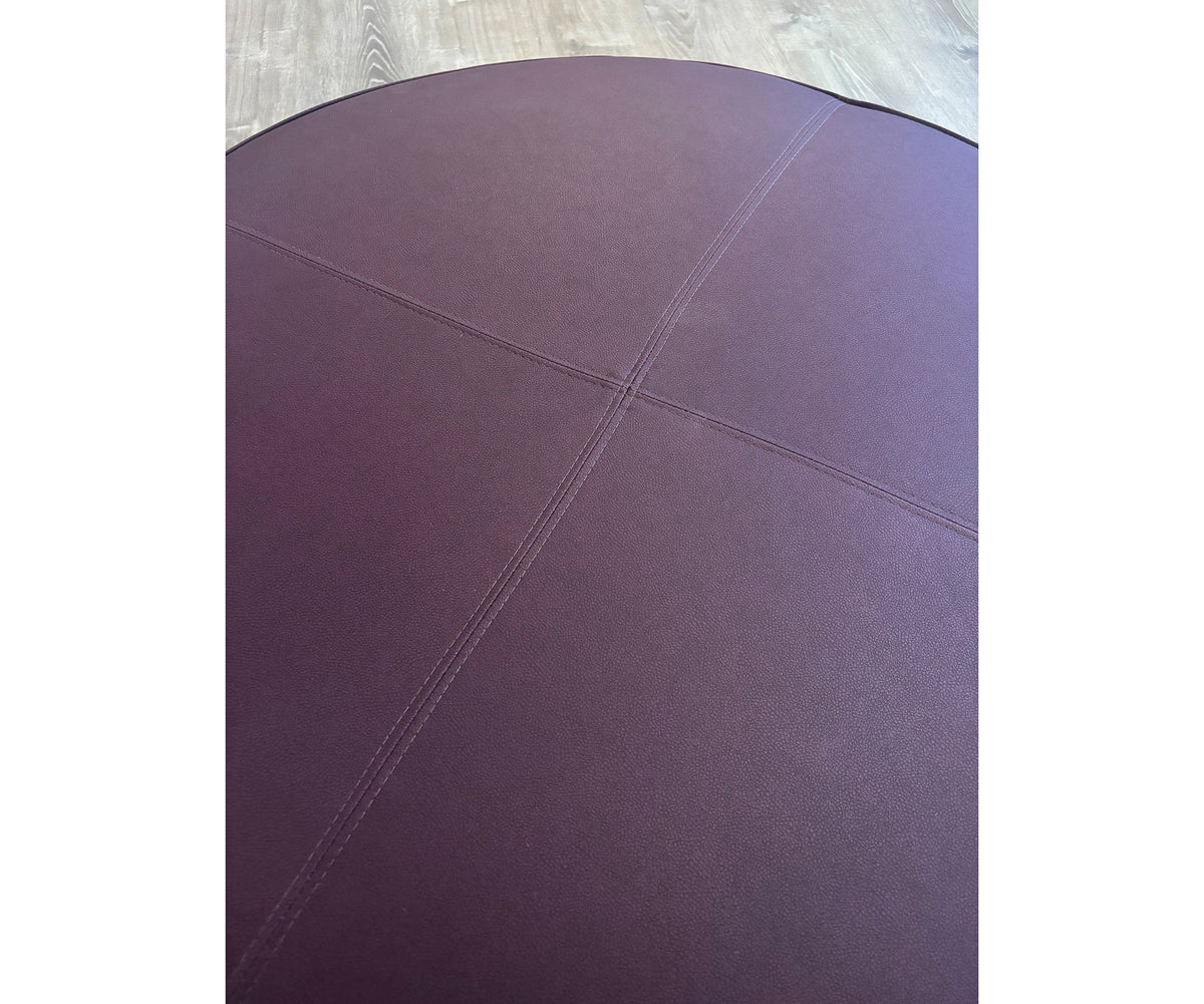 Contemporary burgundy leather round ottoman floor sample – Casa Design Group