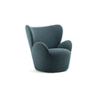Libelle Armchair by Frigerio featuring a sculptural silhouette inspired by dragonfly wings, upholstered seating, and contemporary Italian design.