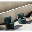 Libelle Armchair by Frigerio featuring a sculptural silhouette inspired by dragonfly wings, upholstered seating, and contemporary Italian design.