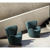 Libelle Armchair by Frigerio featuring a sculptural silhouette inspired by dragonfly wings, upholstered seating, and contemporary Italian design.