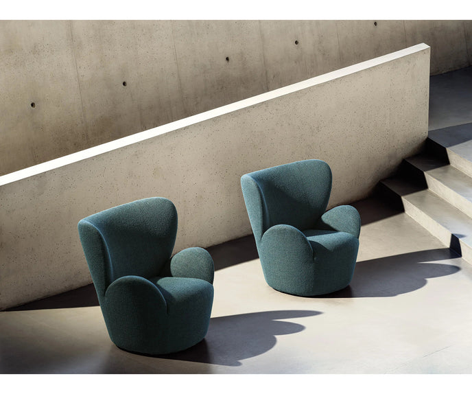 Libelle Armchair by Frigerio featuring a sculptural silhouette inspired by dragonfly wings, upholstered seating, and contemporary Italian design.