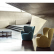 Libelle Armchair by Frigerio featuring a sculptural silhouette inspired by dragonfly wings, upholstered seating, and contemporary Italian design.
