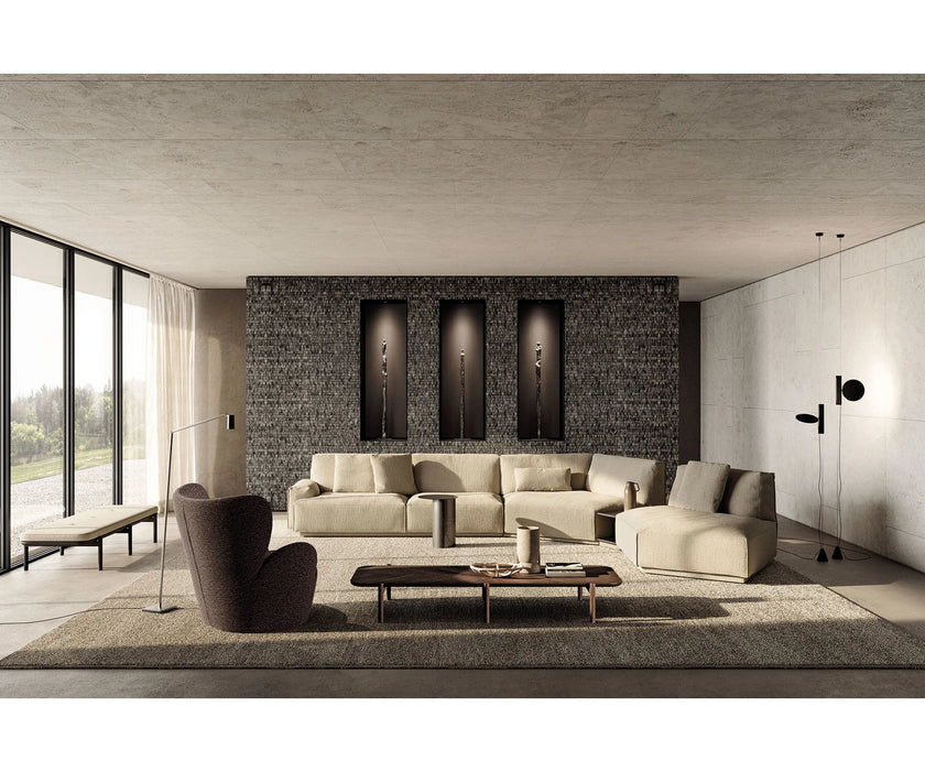 Libelle Armchair by Frigerio featuring a sculptural silhouette inspired by dragonfly wings, upholstered seating, and contemporary Italian design.