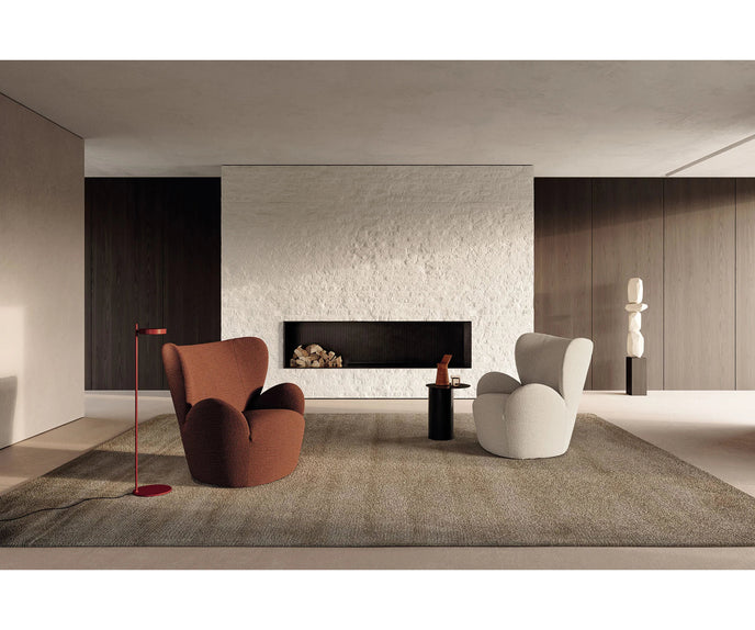 Libelle Armchair by Frigerio featuring a sculptural silhouette inspired by dragonfly wings, upholstered seating, and contemporary Italian design.