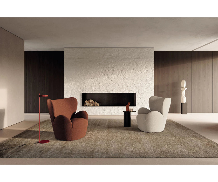 Libelle Armchair by Frigerio featuring a sculptural silhouette inspired by dragonfly wings, upholstered seating, and contemporary Italian design.