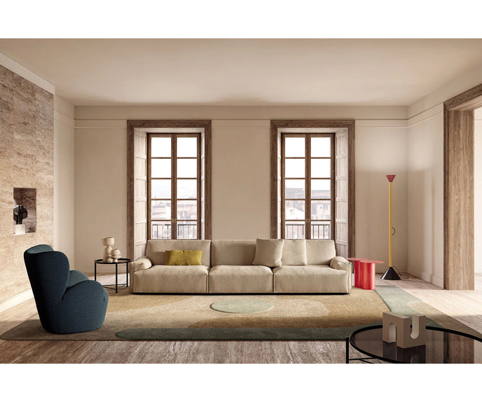 Libelle Armchair by Frigerio featuring a sculptural silhouette inspired by dragonfly wings, upholstered seating, and contemporary Italian design.