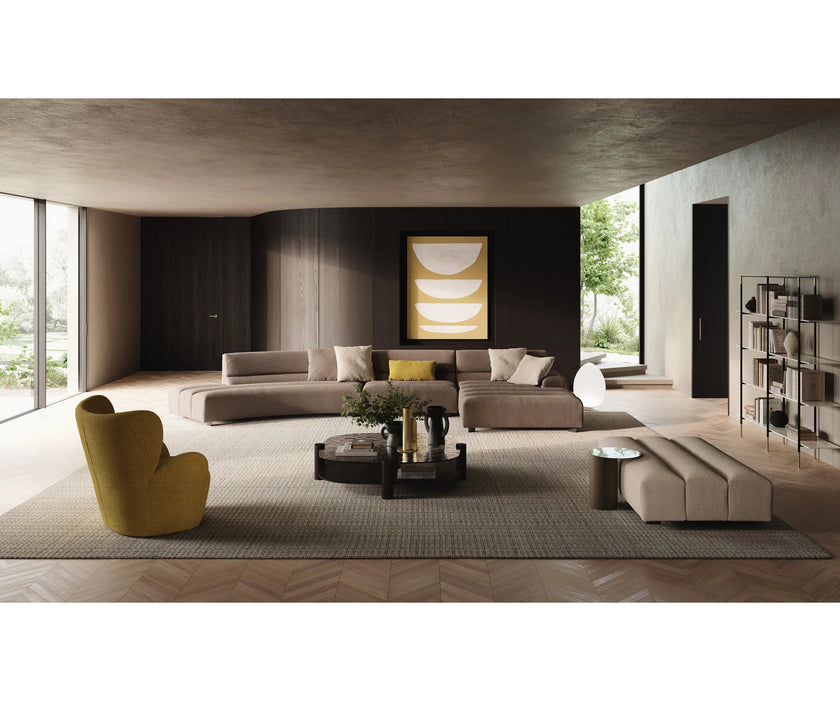 Libelle Armchair by Frigerio featuring a sculptural silhouette inspired by dragonfly wings, upholstered seating, and contemporary Italian design.