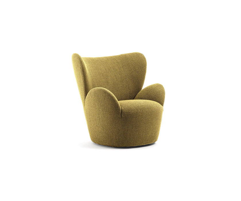 Libelle Armchair by Frigerio featuring a sculptural silhouette inspired by dragonfly wings, upholstered seating, and contemporary Italian design.