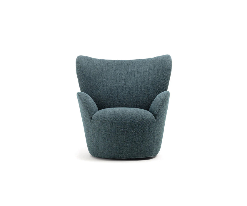 Libelle Armchair by Frigerio featuring a sculptural silhouette inspired by dragonfly wings, upholstered seating, and contemporary Italian design.
