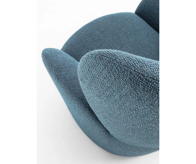 Libelle Armchair by Frigerio featuring a sculptural silhouette inspired by dragonfly wings, upholstered seating, and contemporary Italian design.