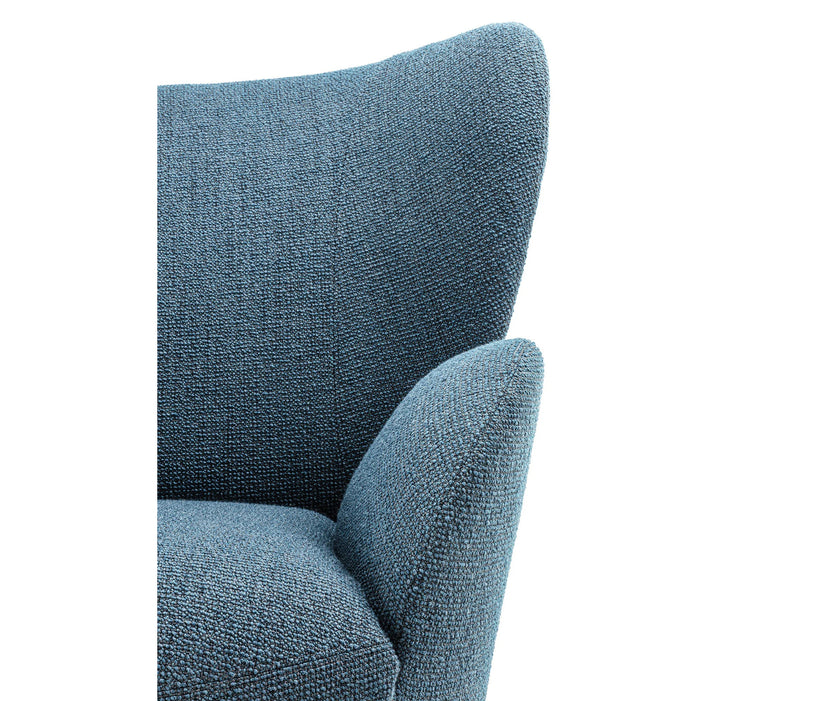Libelle Armchair by Frigerio featuring a sculptural silhouette inspired by dragonfly wings, upholstered seating, and contemporary Italian design.