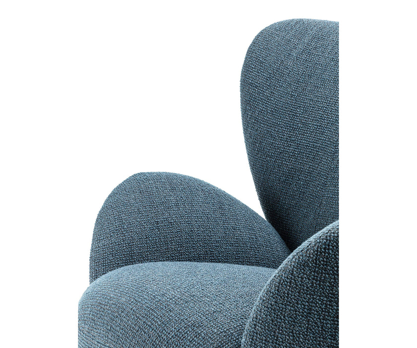 Libelle Armchair by Frigerio featuring a sculptural silhouette inspired by dragonfly wings, upholstered seating, and contemporary Italian design.
