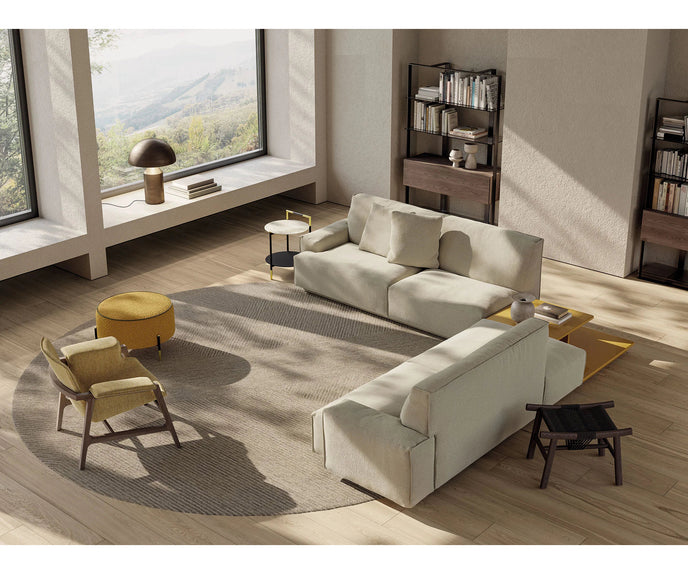 Luxury Arianna armchair by Frigerio with a solid ashwood frame and premium fabric or leather upholstery at Casa Design Group.