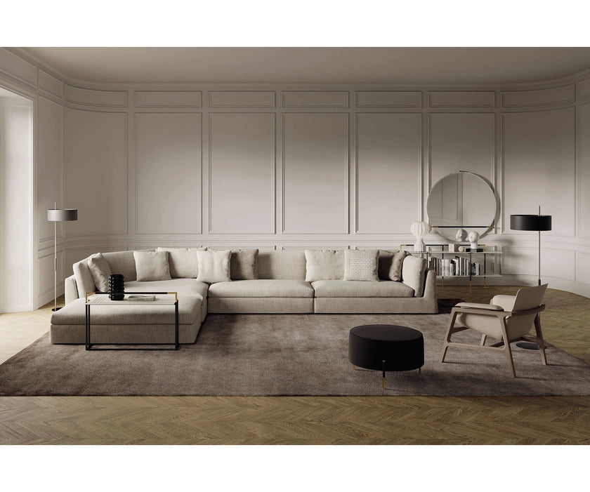 Luxury Arianna armchair by Frigerio with a solid ashwood frame and premium fabric or leather upholstery at Casa Design Group.