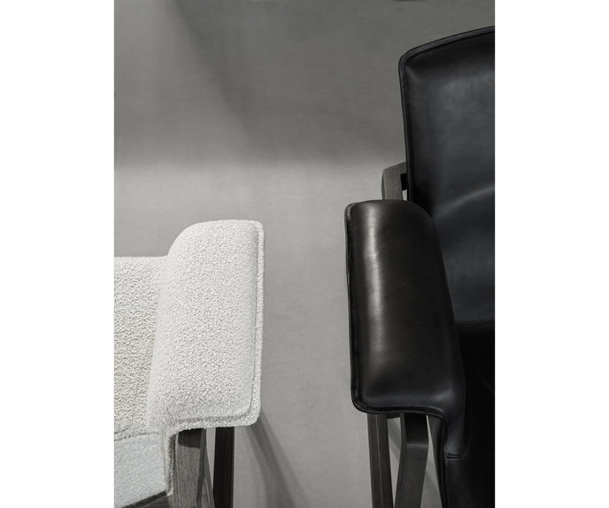 Luxury Arianna armchair by Frigerio with a solid ashwood frame and premium fabric or leather upholstery at Casa Design Group.