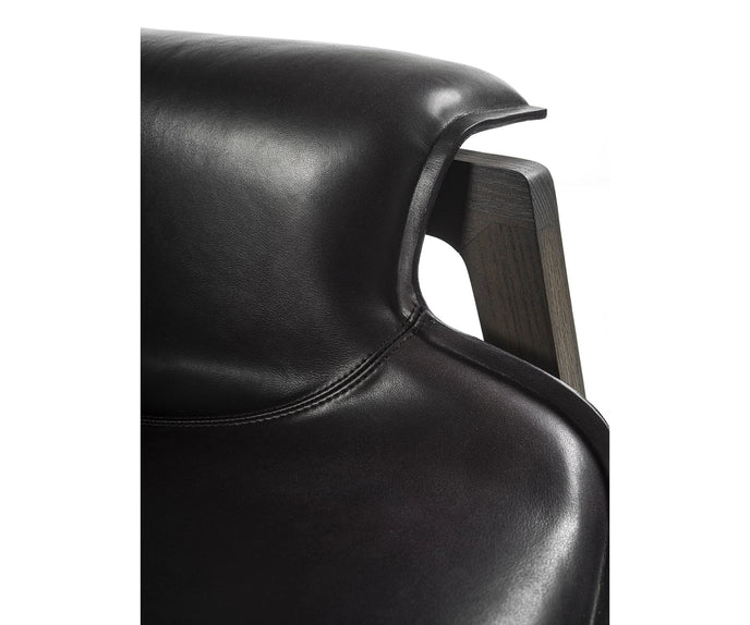 Luxury Arianna armchair by Frigerio with a solid ashwood frame and premium fabric or leather upholstery at Casa Design Group.