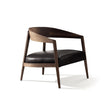 Luxury Lizzye armchair by Frigerio with a solid ashwood frame and premium fabric or leather upholstery | Casa Design Group
