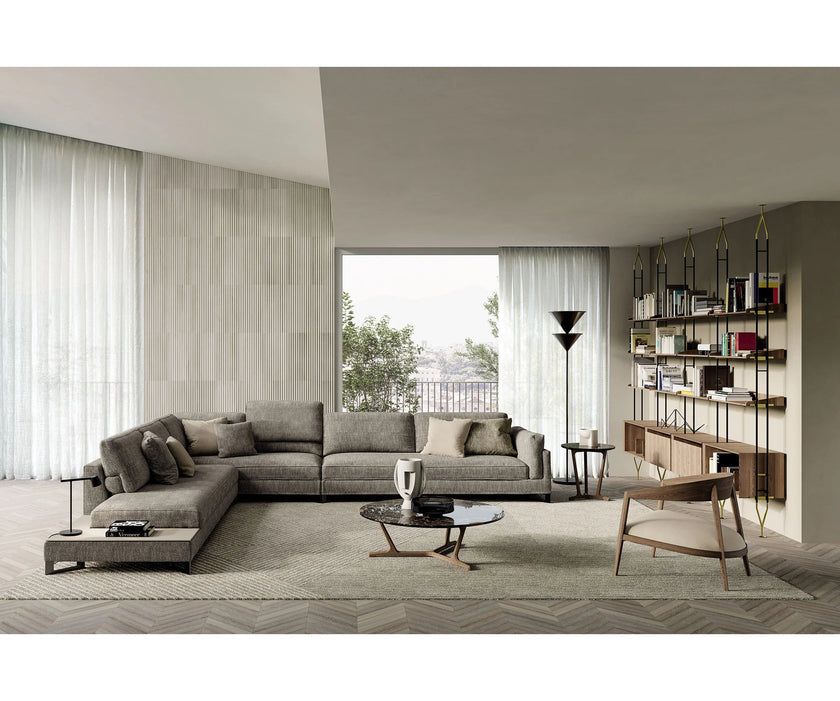 Luxury Lizzye armchair by Frigerio with a solid ashwood frame and premium fabric or leather upholstery | Casa Design Group