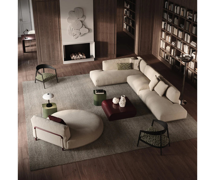 Luxury Lizzye armchair by Frigerio with a solid ashwood frame and premium fabric or leather upholstery | Casa Design Group