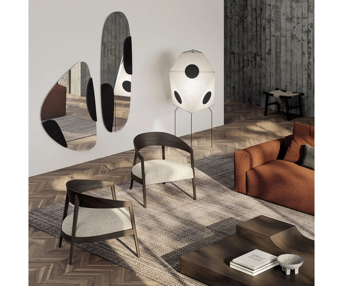 Luxury Lizzye armchair by Frigerio with a solid ashwood frame and premium fabric or leather upholstery | Casa Design Group