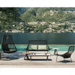 Maia Relax Chair by Kettal featuring a braided Chesnut Maia frame with laminate fabric cushions, modern outdoor lounge chair for luxury patio and terrace spaces | Casa Design Group