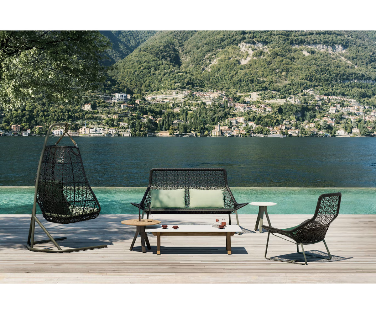 Maia Relax Chair by Kettal featuring a braided Chesnut Maia frame with laminate fabric cushions, modern outdoor lounge chair for luxury patio and terrace spaces | Casa Design Group