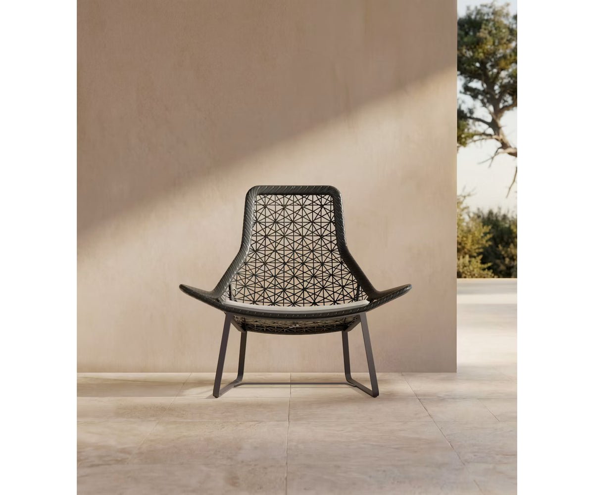 Maia Relax Chair by Kettal featuring a braided Chesnut Maia frame with laminate fabric cushions, modern outdoor lounge chair for luxury patio and terrace spaces | Casa Design Group