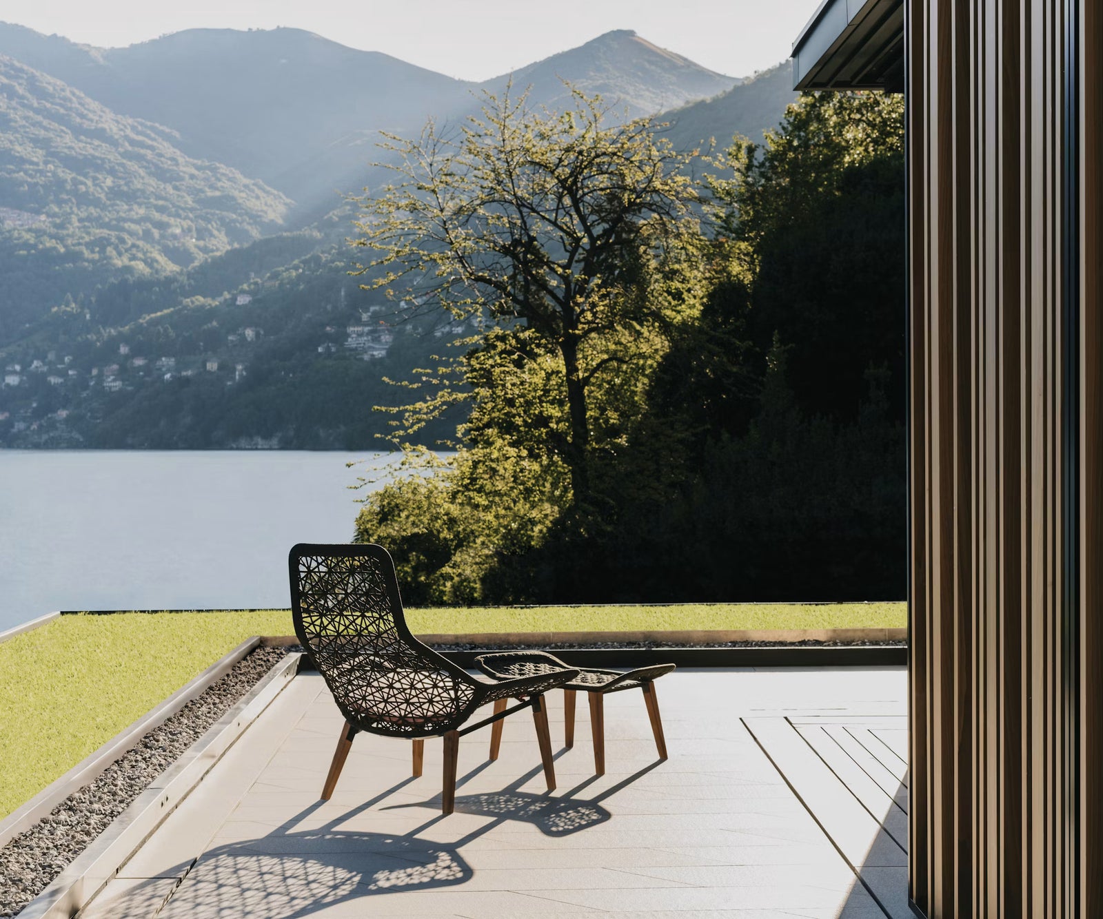 Maia Teak Marengo Relax Chair by Kettal featuring Marengo braided rope, teak legs, and a fog laminate seat cushion, luxury outdoor lounge chair for patios and terraces | Casa Design Group