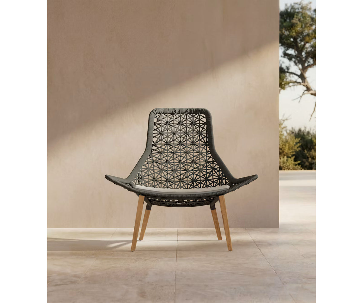 Maia Teak Marengo Relax Chair by Kettal featuring Marengo braided rope, teak legs, and a fog laminate seat cushion, luxury outdoor lounge chair for patios and terraces | Casa Design Group