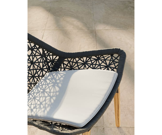 Maia Teak Marengo Relax Chair by Kettal featuring Marengo braided rope, teak legs, and a fog laminate seat cushion, luxury outdoor lounge chair for patios and terraces | Casa Design Group