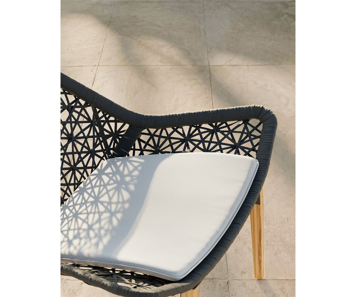 Maia Teak Marengo Relax Chair by Kettal featuring Marengo braided rope, teak legs, and a fog laminate seat cushion, luxury outdoor lounge chair for patios and terraces | Casa Design Group