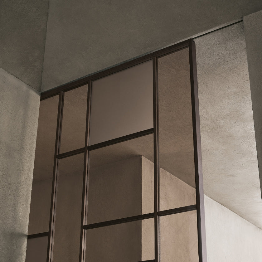 Maxi Sliding Door System with expansive glass panels, aluminum frames and decorative grid patterns by Rimadesio | Casa Design Group
