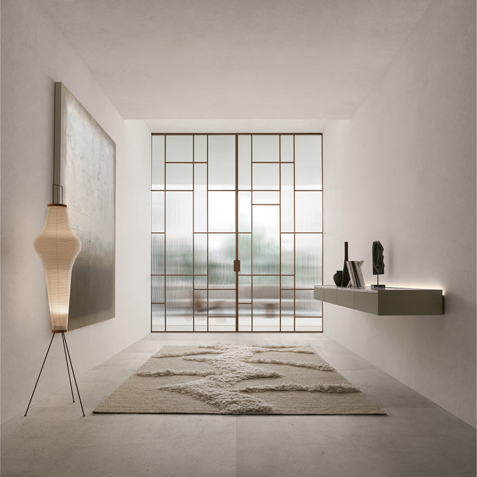 Maxi Sliding Door System with expansive glass panels, aluminum frames and decorative grid patterns by Rimadesio | Casa Design Group