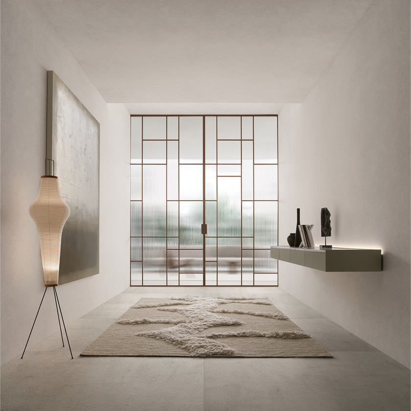 Maxi Sliding Door System with expansive glass panels, aluminum frames and decorative grid patterns by Rimadesio | Casa Design Group