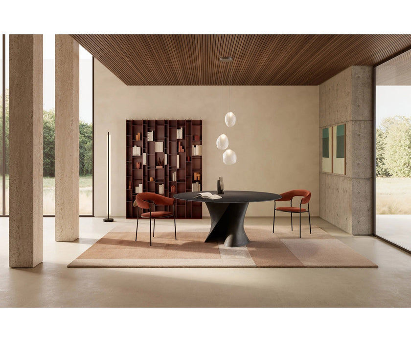 MDF Italia Archie Dining Armchair by Yabu Pushelberg with a tubular steel frame and upholstered seat | Casa Design Group