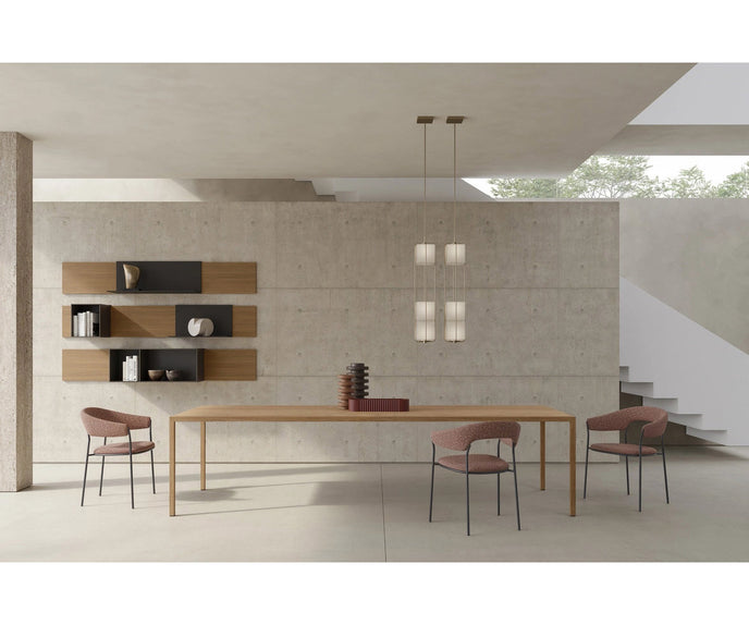 MDF Italia Archie Dining Armchair by Yabu Pushelberg with a tubular steel frame and upholstered seat | Casa Design Group