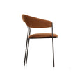 MDF Italia Archie Dining Armchair by Yabu Pushelberg with a tubular steel frame and upholstered seat | Casa Design Group