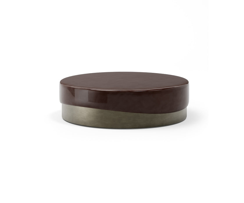 Merian Coffee Table by Capital with a glossy lacquered round top and metallic base.
