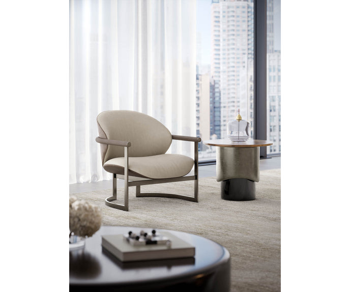 Merian Coffee Table by Capital with a glossy lacquered round top and metallic base.