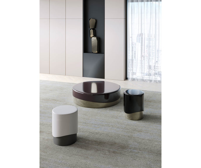 Merian Coffee Table by Capital with a glossy lacquered round top and metallic base.