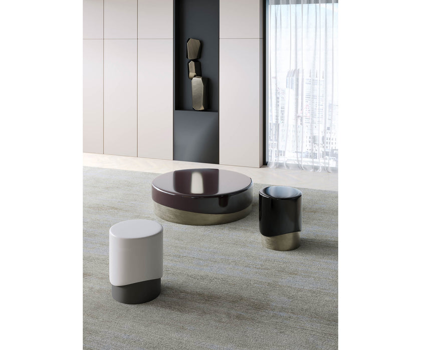 Merian Coffee Table by Capital with a glossy lacquered round top and metallic base.