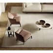Amanda Lounge Chair by Frigerio featuring sculptural suspended armrests, a solid ashwood base, and premium Italian upholstery | Casa Design Group