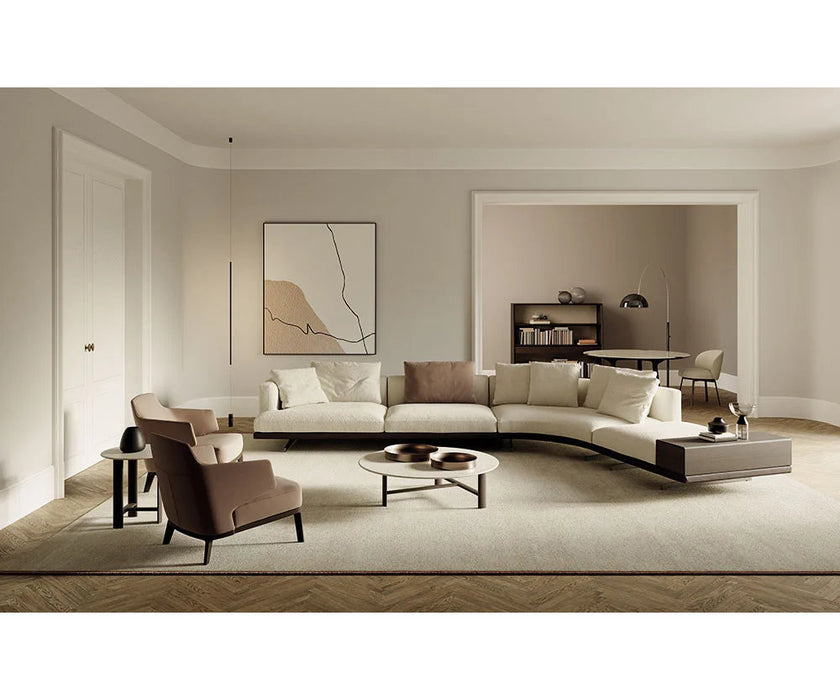 Amanda Lounge Chair by Frigerio featuring sculptural suspended armrests, a solid ashwood base, and premium Italian upholstery | Casa Design Group