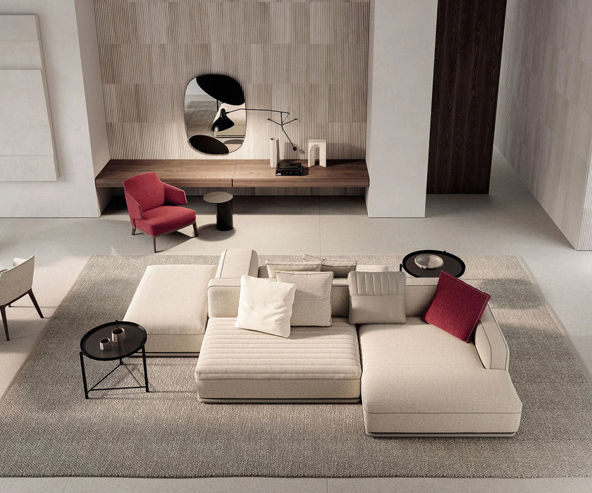 Amanda Lounge Chair by Frigerio featuring sculptural suspended armrests, a solid ashwood base, and premium Italian upholstery | Casa Design Group