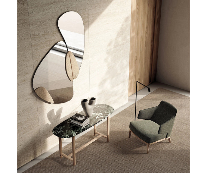 Amanda Lounge Chair by Frigerio featuring sculptural suspended armrests, a solid ashwood base, and premium Italian upholstery | Casa Design Group