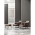 Amanda Lounge Chair by Frigerio featuring sculptural suspended armrests, a solid ashwood base, and premium Italian upholstery | Casa Design Group