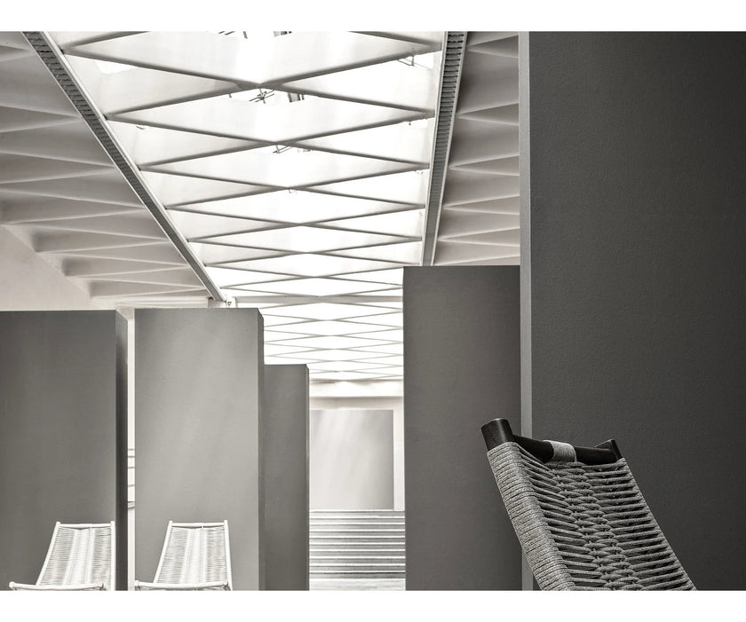 Huli Lounge Chair by Frigerio with solid ashwood frame, braided rope detailing, and premium Italian upholstery | Casa Design Group